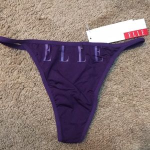 “Elle” purple thong. Brand new with tags.